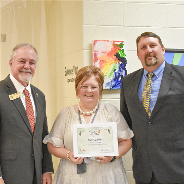 Mrs Jenkins with State Superintendent Woods and Superintendent Lowe