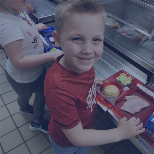  Student with meal tray in cafeteria